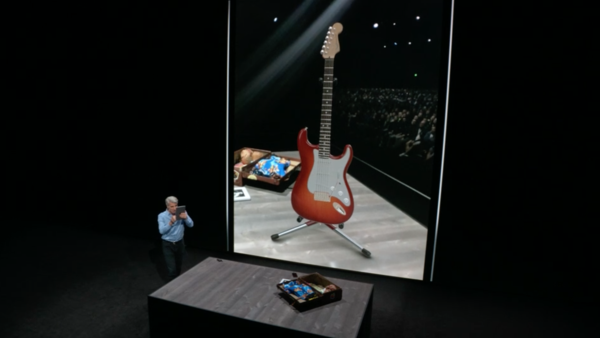 USDZ-formaatilla luotu 3D-malli kitarasta voidaan sijoittaa kameranäkymän kautta tosimaailmaan.